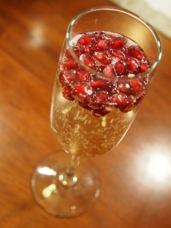 champagne with pomegranate seeds