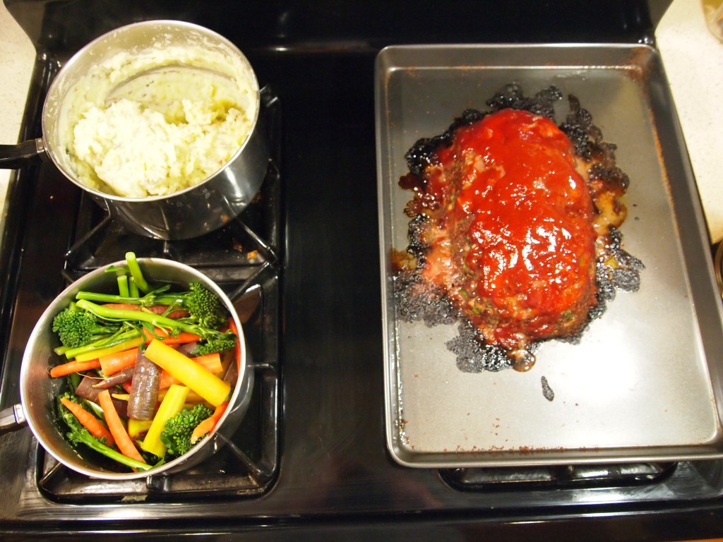 meatloaf, veggies, and potato/parsnip mash on stovetop