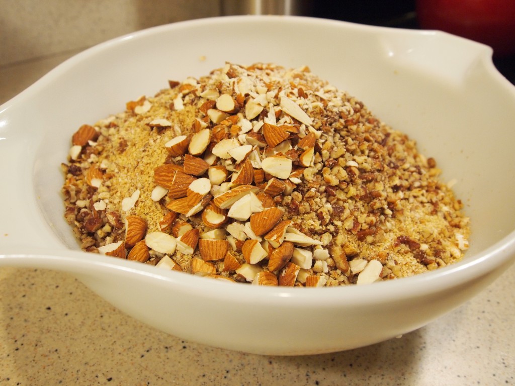 bowl of toasted oats, nuts, wheat germ, and cereal