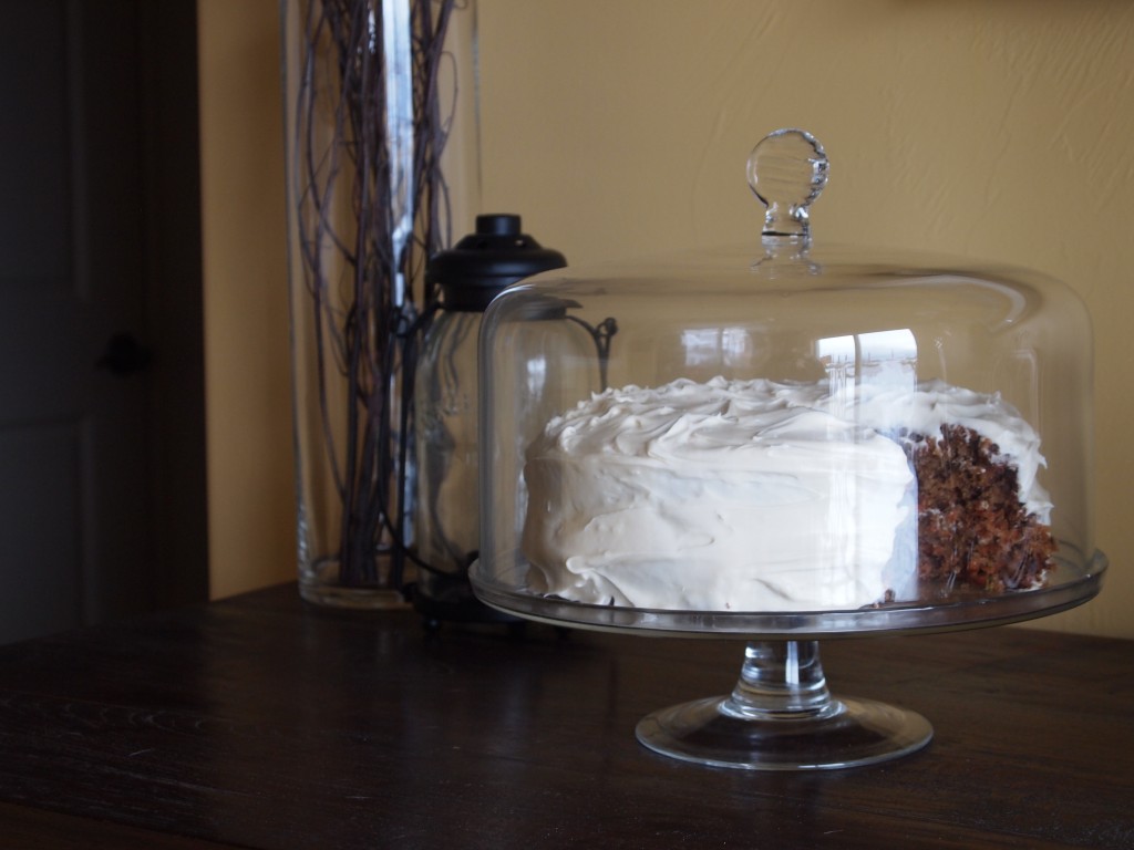 carrot layer cake on a pretty cake stand