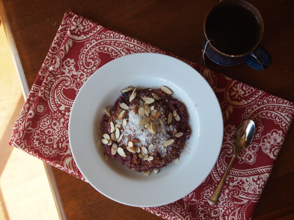 bowl of oatmeal with a cup of tea